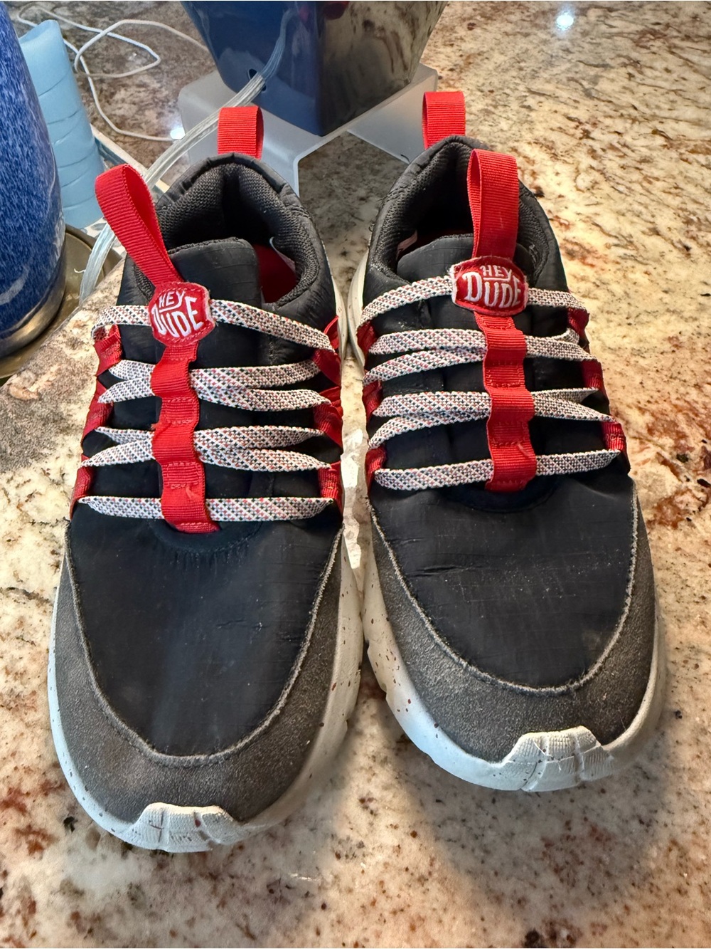 Hey Dude Kids Black and Red Slip-On Sneakers with Patterned Laces